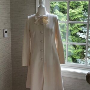 Elegant Cream Coat with Bow Detail